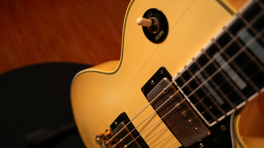 1985 Gibson Les Paul Custom – Aged Pearl White (9.0 lbs) w/ Pro Refret & '80s Chainsaw Case